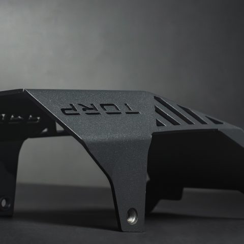 TORP aluminum skid plate installed on a Sur-Ron Light Bee